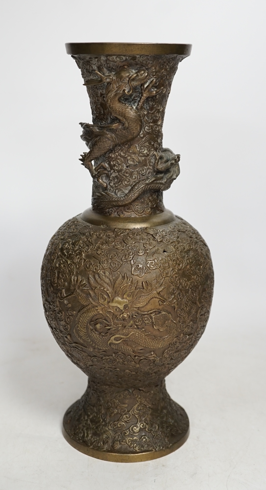 A 19th century Chinese or Japanese bronze ‘dragon’ vase, 33cm. Condition - fair